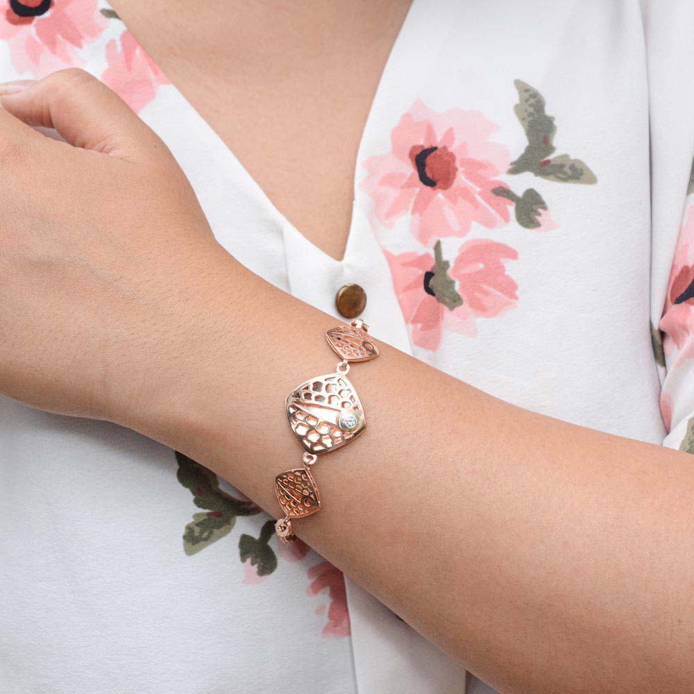 Wearing a gold bracele