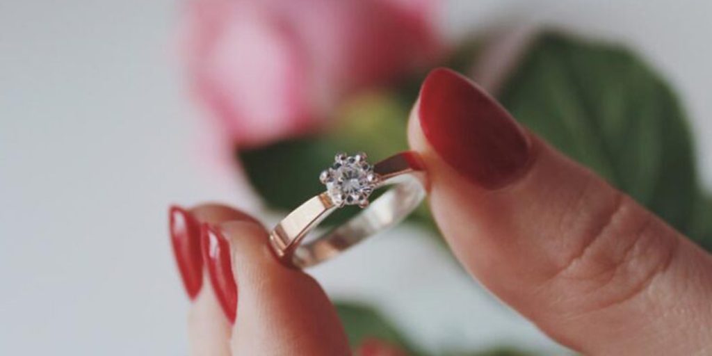 Image of A Girl Fingers Showing Her Engagement Ring-XJ098940-Picxy