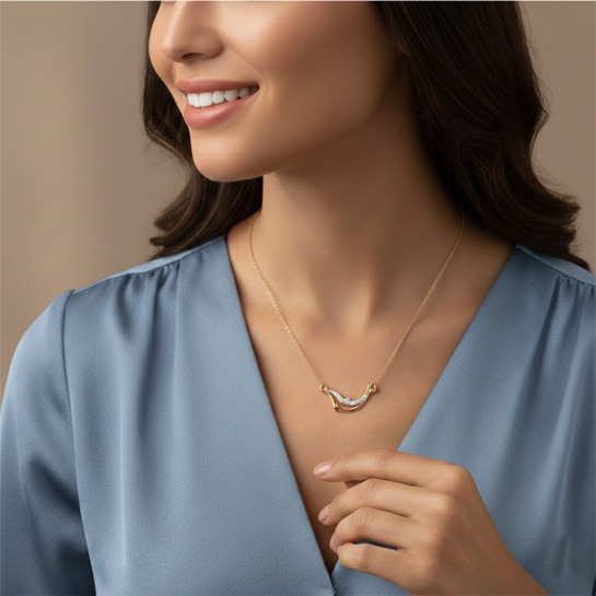 Golden Wave Dolphin Pendant